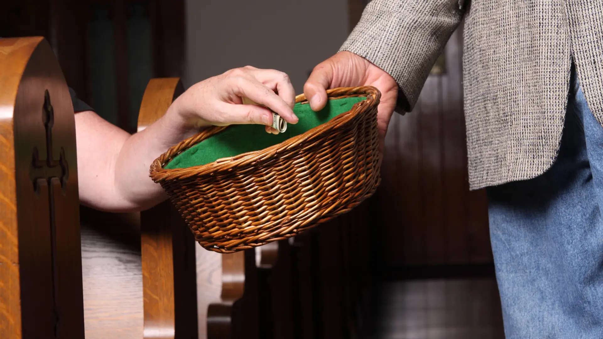 church tithings in a green basket